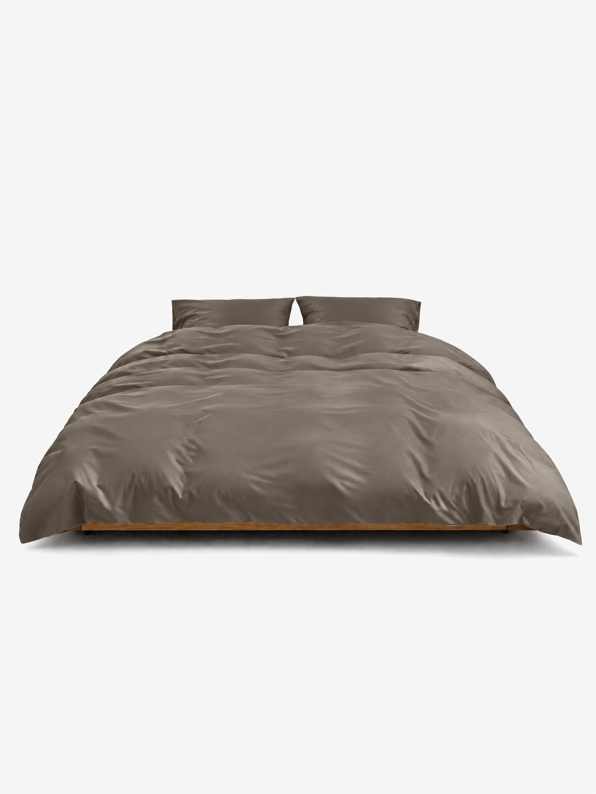 Serinia Bettwäsche Set Taupe auf einem Bett