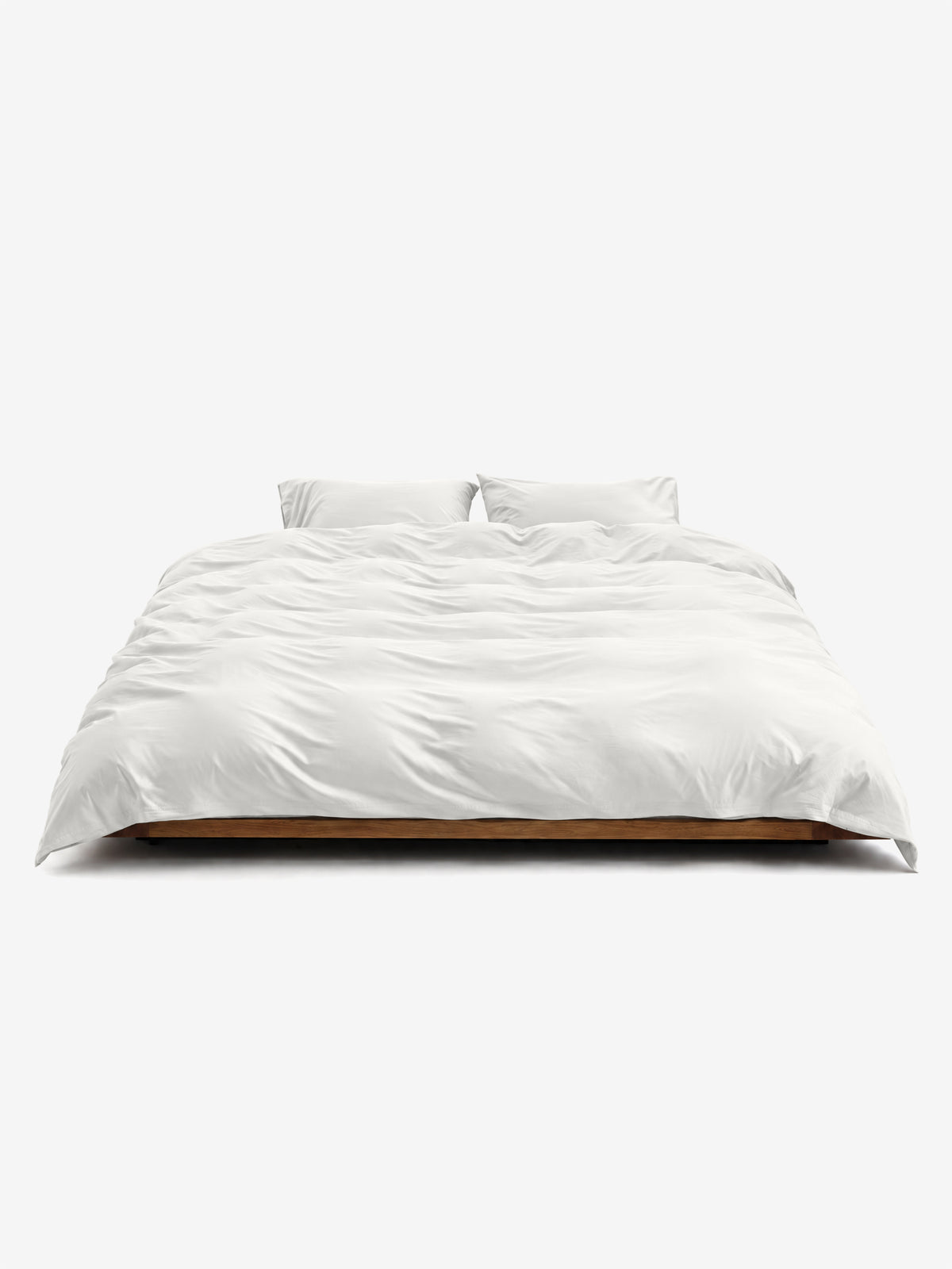 Serinia Bettwäsche Set Weiss auf einem Bett